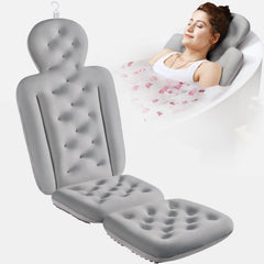 VOXOR full body bath pillow top view shows neck and back support in a spa-like setup