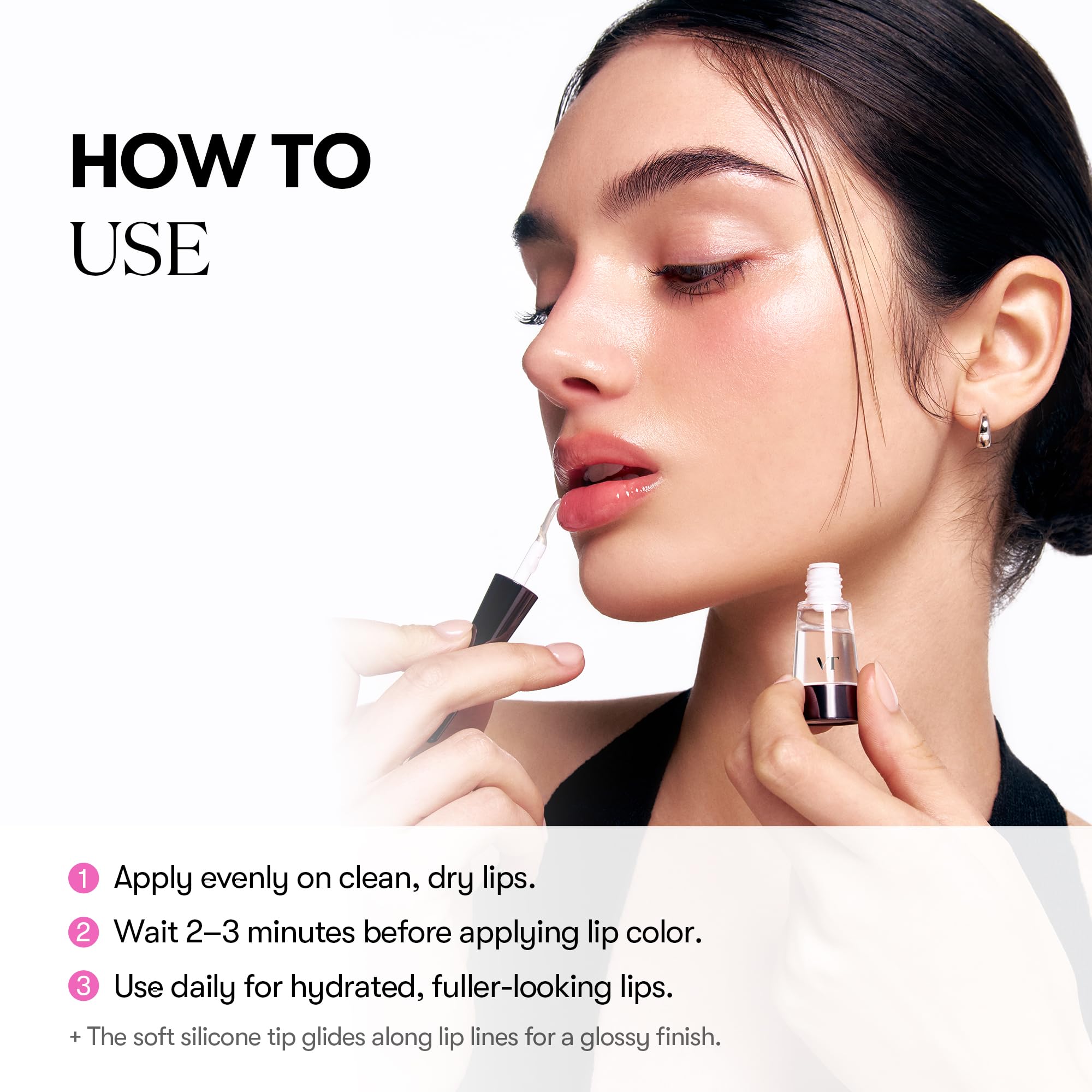 VT COSMETICS Reedle Shot Lip Plumper on lips with transparent gloss highlight.
