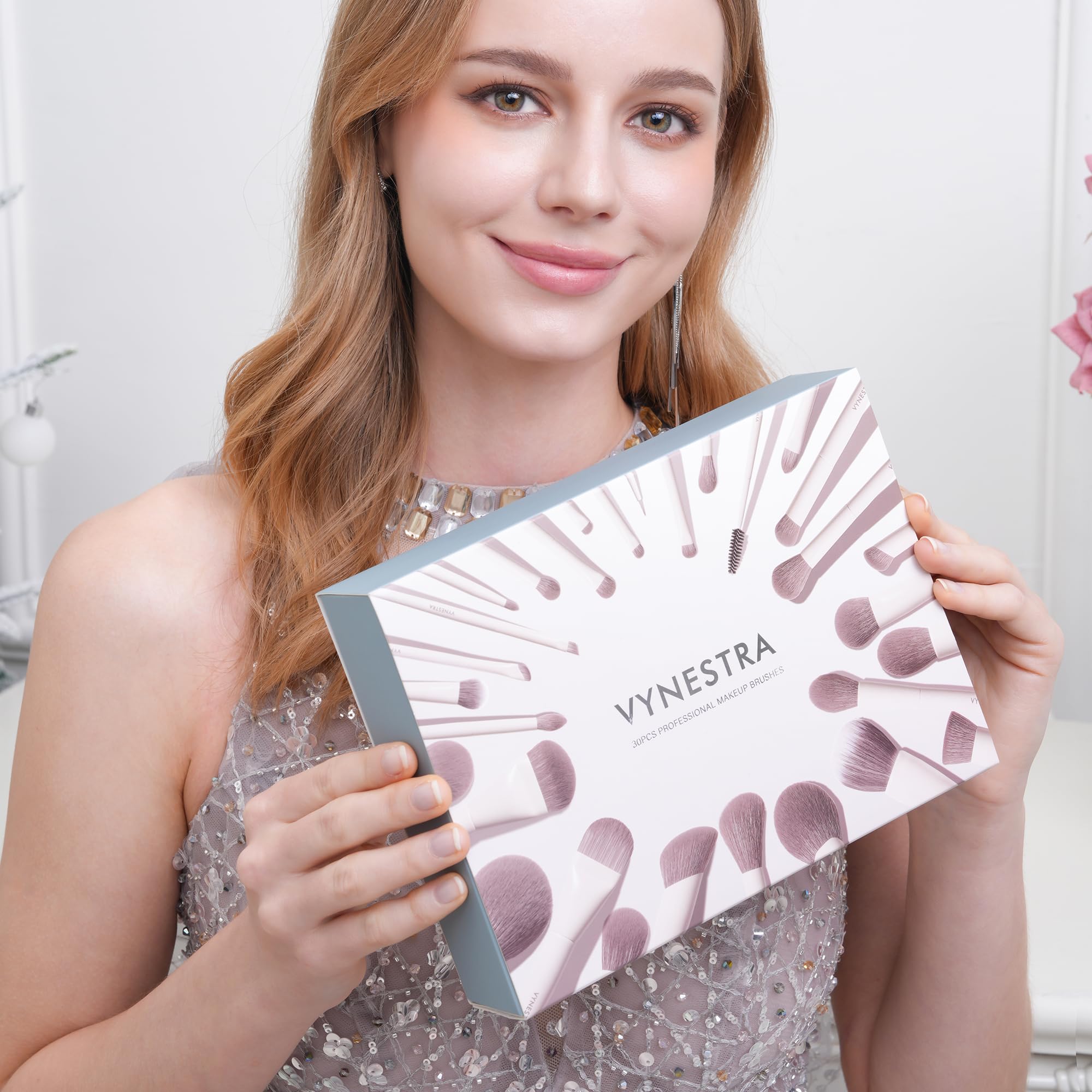 VYNESTRA wooden-handle brush for comfortable grip during makeup sessions.