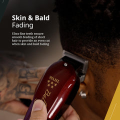Wahl Professional balding blade on clipper head demonstrates smooth operation.