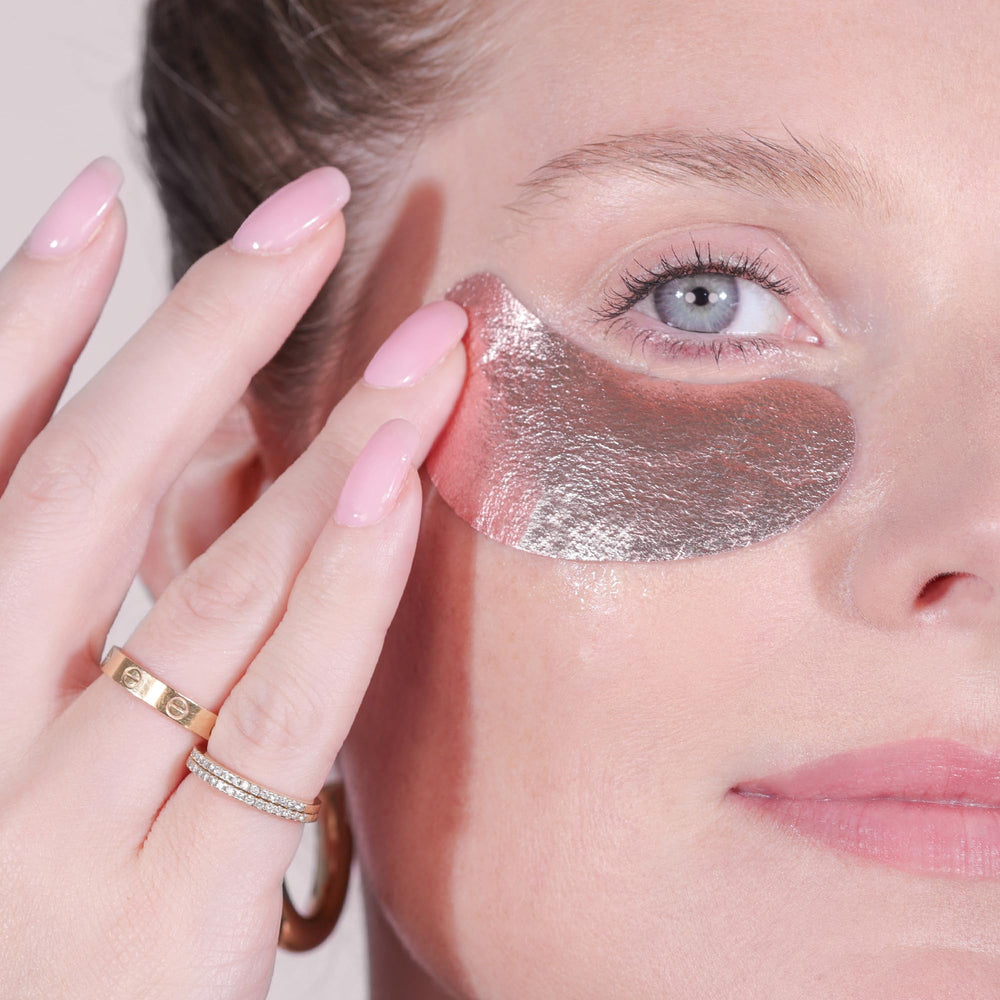 Wander Beauty Baggage Claim rose-gold foil with highlights of key ingredients.