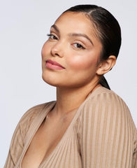 Wander Beauty On-the-Glow nude glow highlighter on face for soft universal glow
