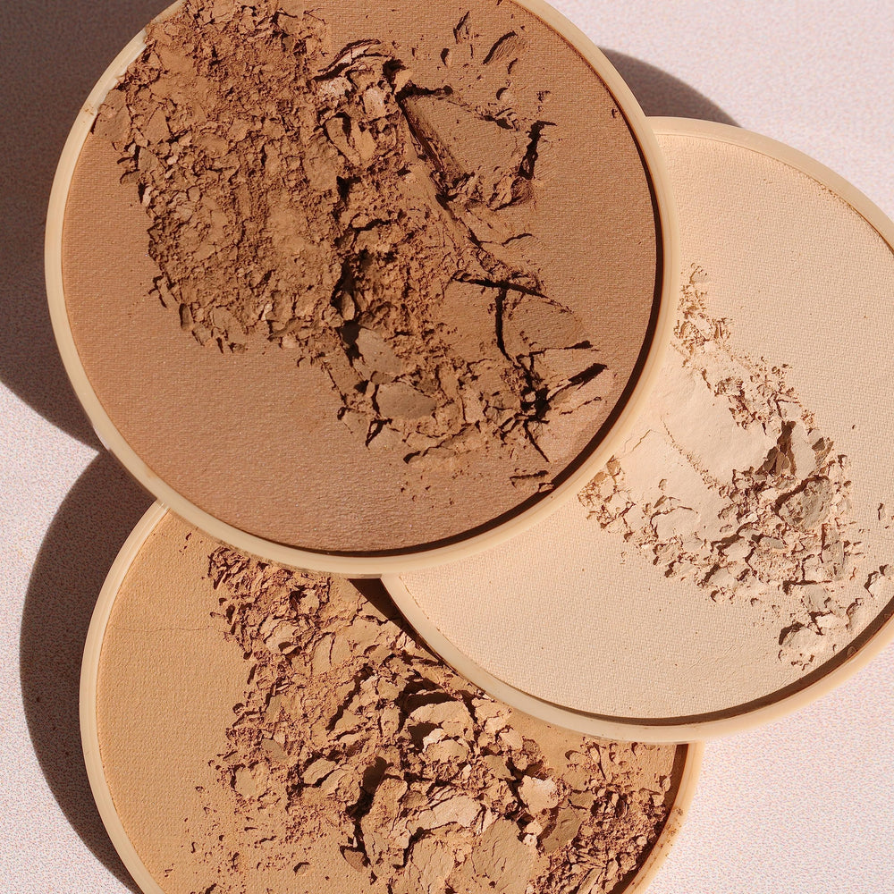 Wander Beauty Wanderlust Powder Foundation Medium close-up finish emphasizes even skin tone.