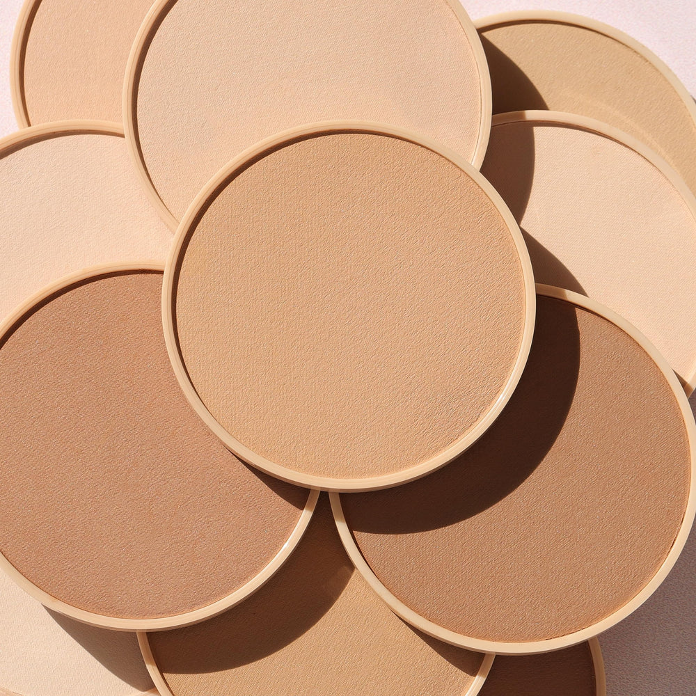 Wander Beauty Wanderlust Powder Foundation Medium packaging highlights portable, travel-friendly compact.