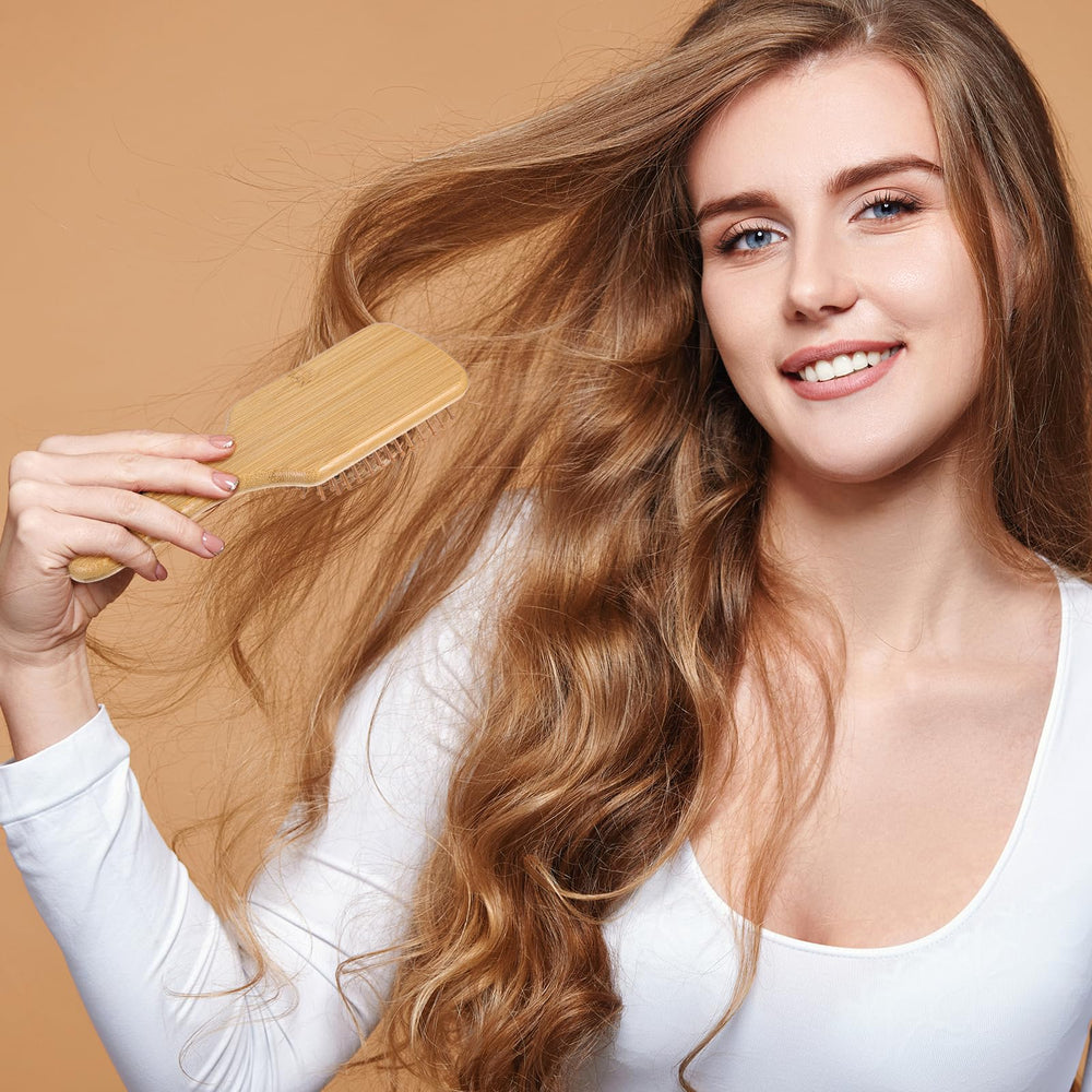 Wanmu bamboo brush's anti-static action helps keep hair smooth in dry conditions.