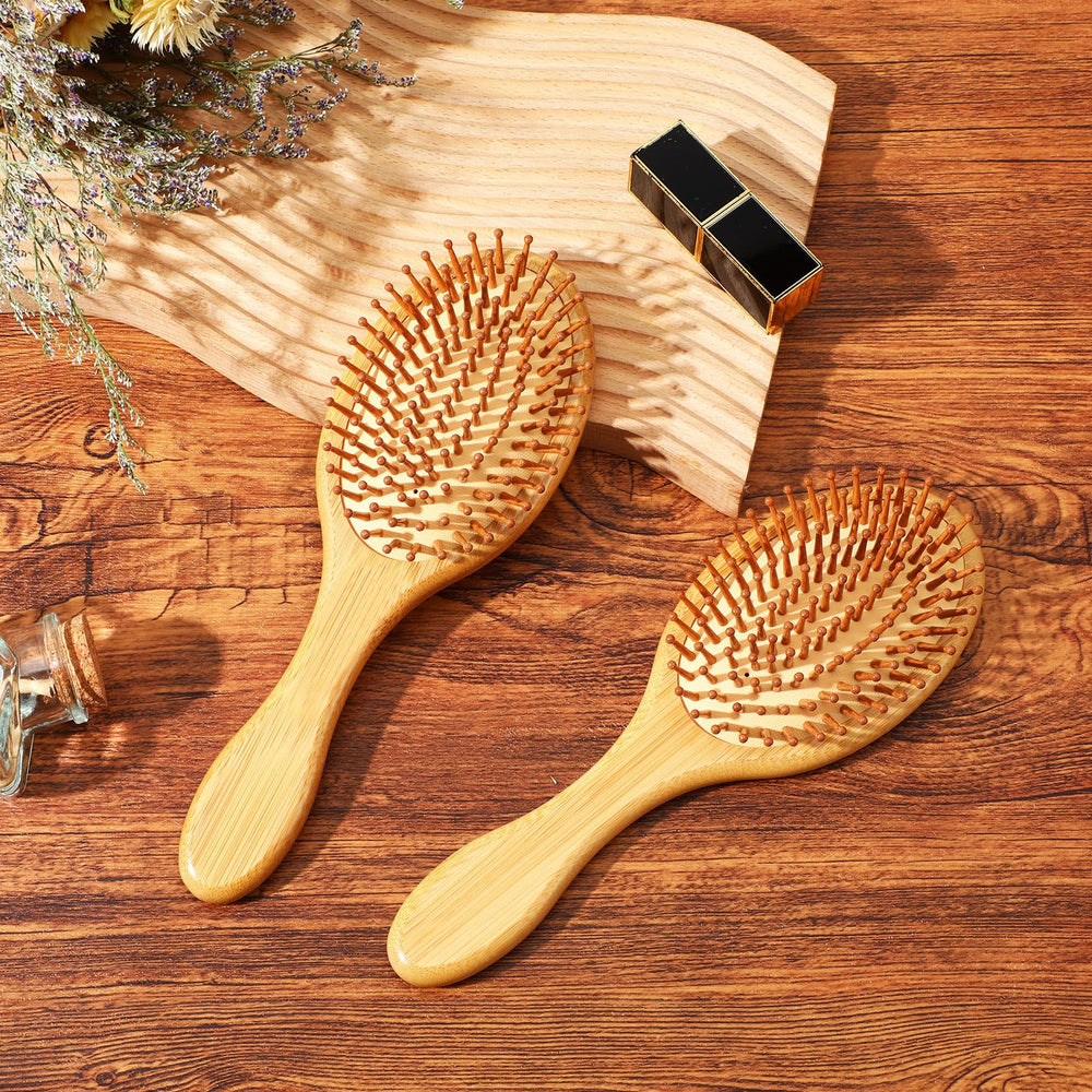 Wanmu bamboo hair brush detangling glide through knots with minimal tug.