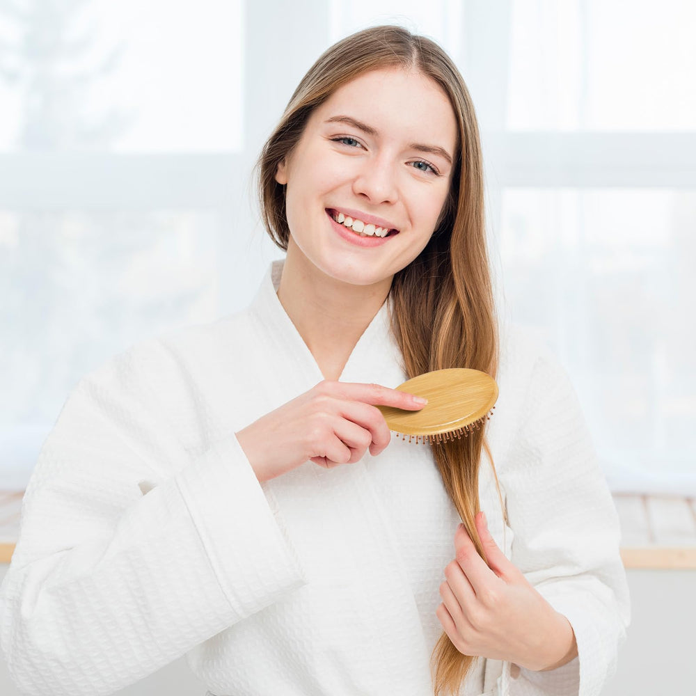 Wanmu bamboo hair brush travel-case makes on-the-go grooming convenient.
