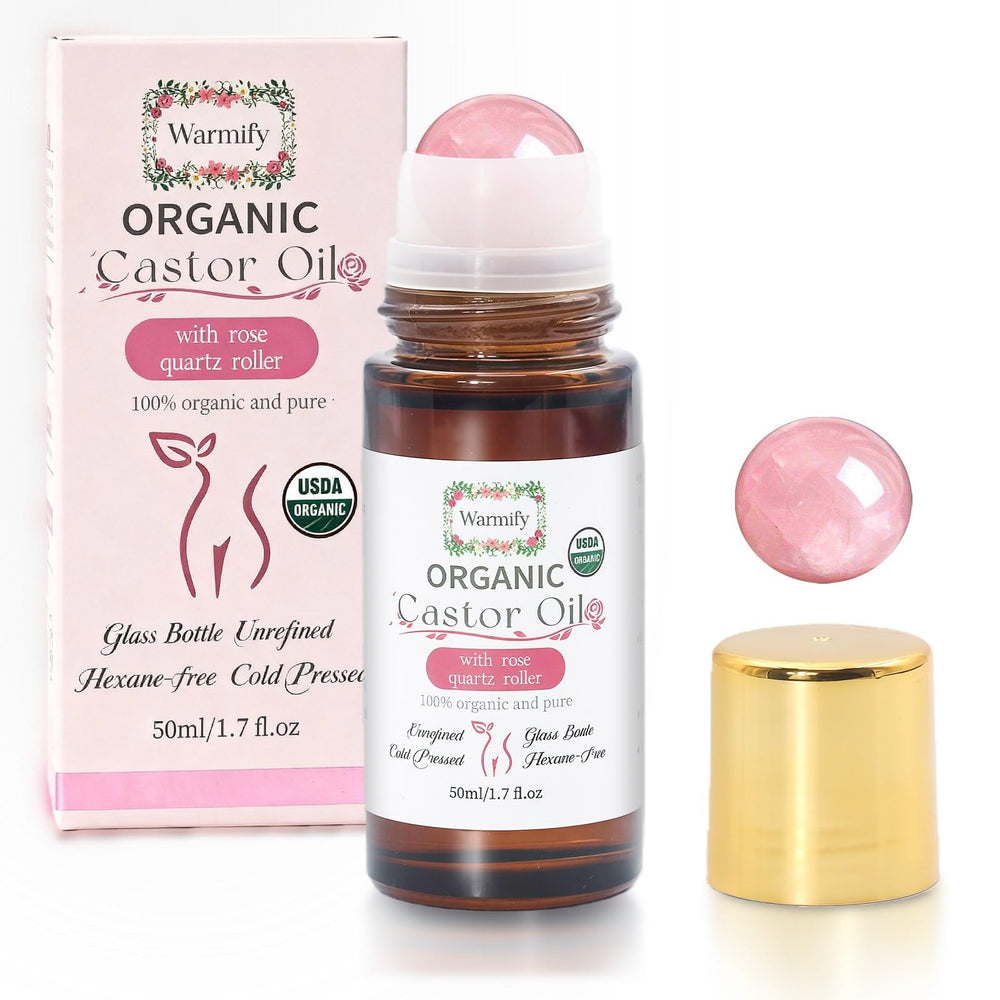 Warmify castor oil with rose quartz roller bottle for full-body hydration