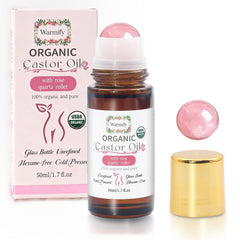 Warmify castor oil with rose quartz roller bottle for full-body hydration