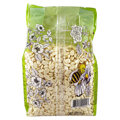 Wax Necessities White Tea Cream wax beads showcase creamy texture for gentle skin protection