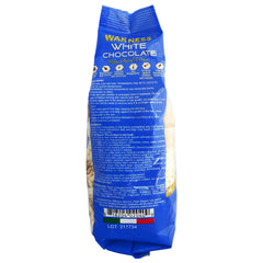 Spatula spreads Waxness hard wax for even layer before removal.