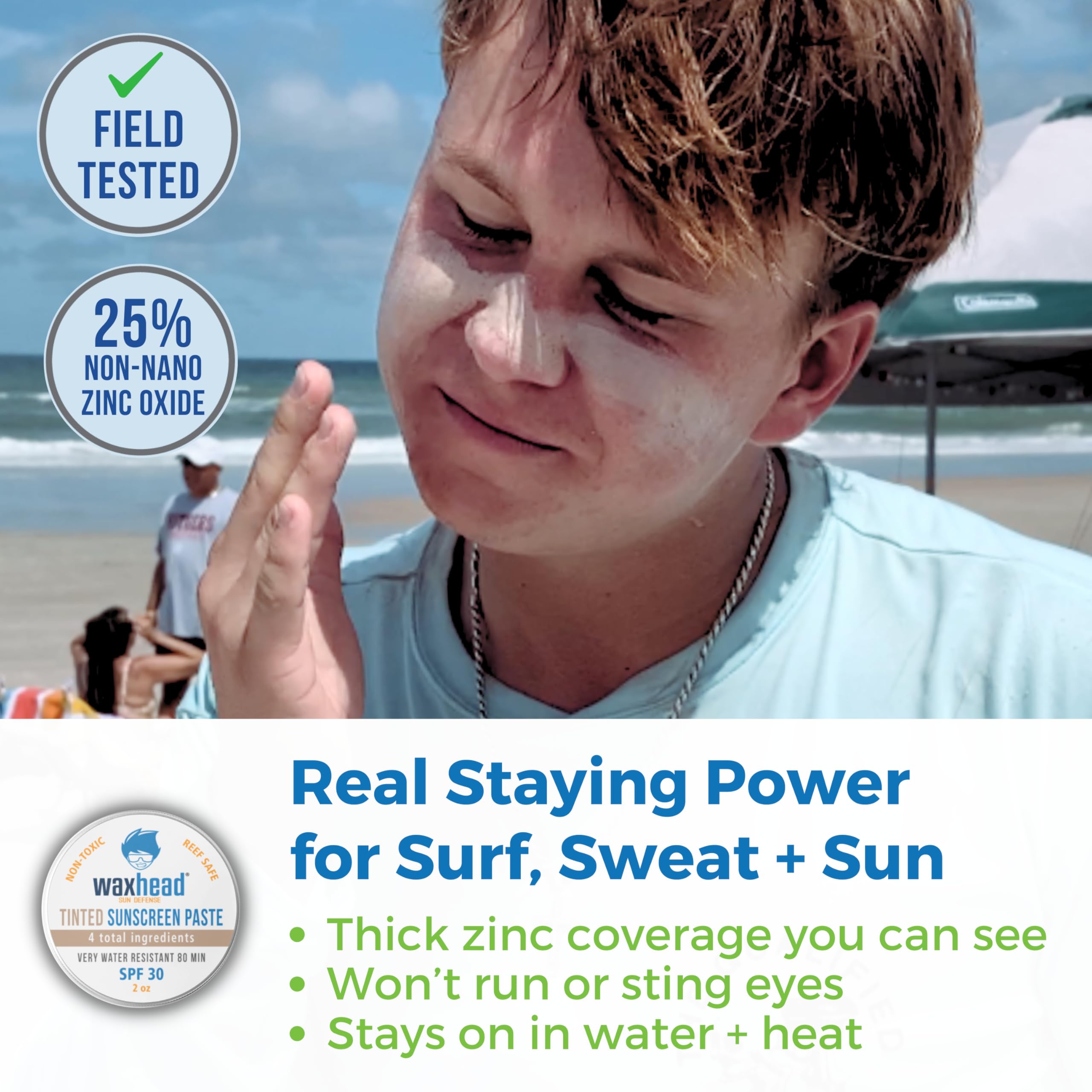 Waxhead surf sunscreen in tin held during open-water swimming for long-lasting protection.