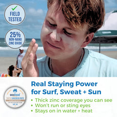 Waxhead surf sunscreen in tin held during open-water swimming for long-lasting protection.