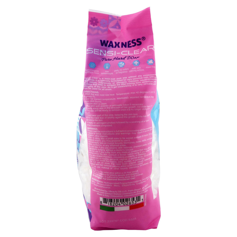 Waxness Sensi Clear Glass translucent melt closeup highlights gentle, low-temp application.