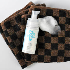 We Love Eyes bottle dispensing action demonstrates easy controlled cleansing during routines