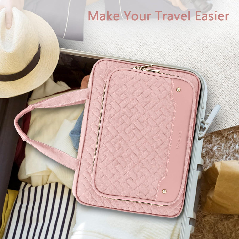 Wedama pink travel bag with metal accents for a chic travel look