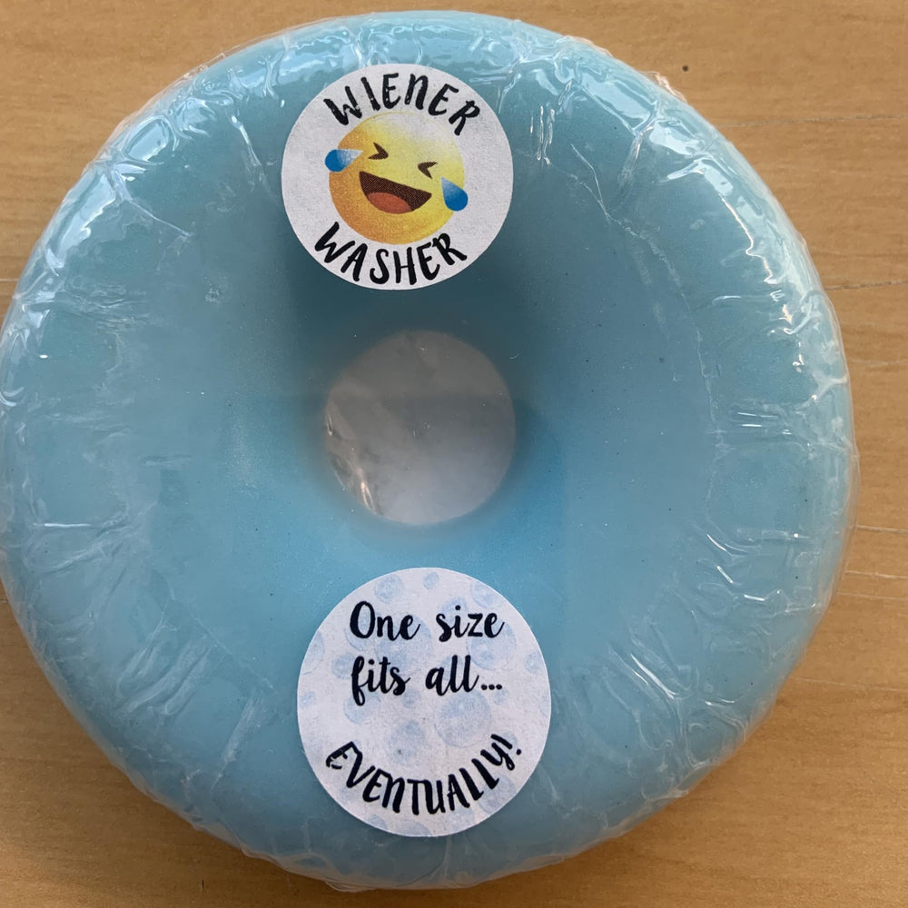 Weiner Washer Soap bar close-up reveals creamy goat milk lather for cleansing.