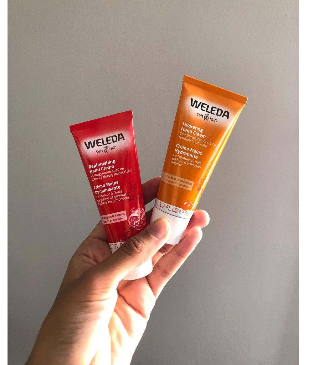 Weleda Regenerating Pomegranate Hand Cream being applied on hands demonstrates swift absorption.