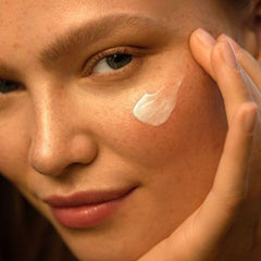 Weleda Skin Food used as a beauty highlighter for subtle glow.