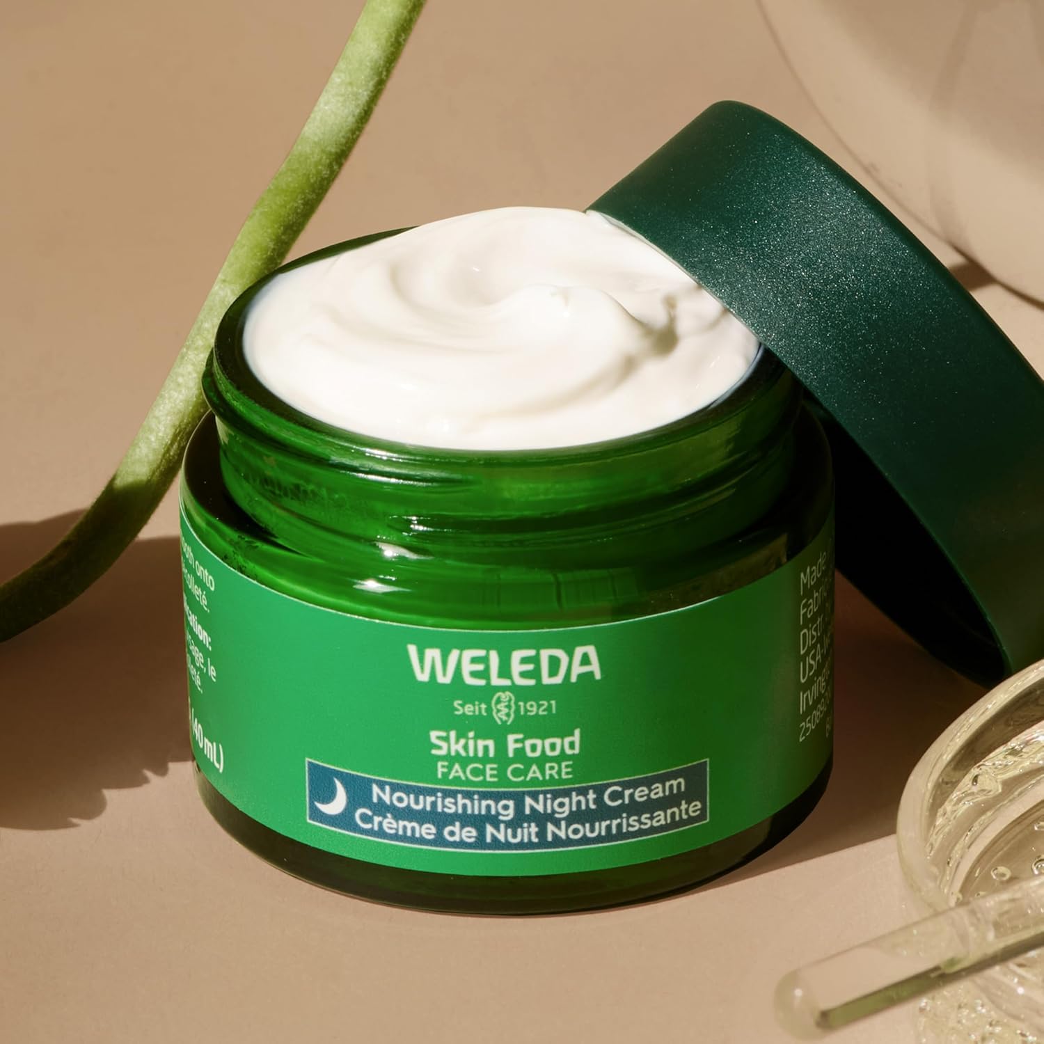 Weleda Skin Food Night Cream packaging label demonstrates vegan formula and natural ingredients.