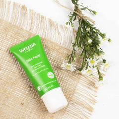 Weleda Skin Food Small on hands demonstrates daily moisturization