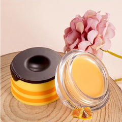 WenFeng propolis lip mask texture on honey pot demonstrates moisturizing feel