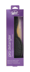 Wet Brush Pro Detangler demonstrates detangling action on tangled hair.