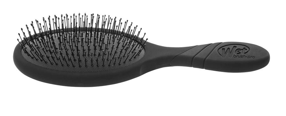 Wet Brush Pro Detangler in wet hair for smooth, gentle glide.