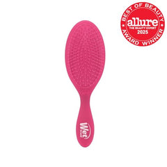 Wet Brush Original Detangler Pink Frost on wet hair for smooth detangling.
