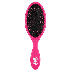 Wet Brush Original Detangler Pink handle closeup — gentle knot removal.