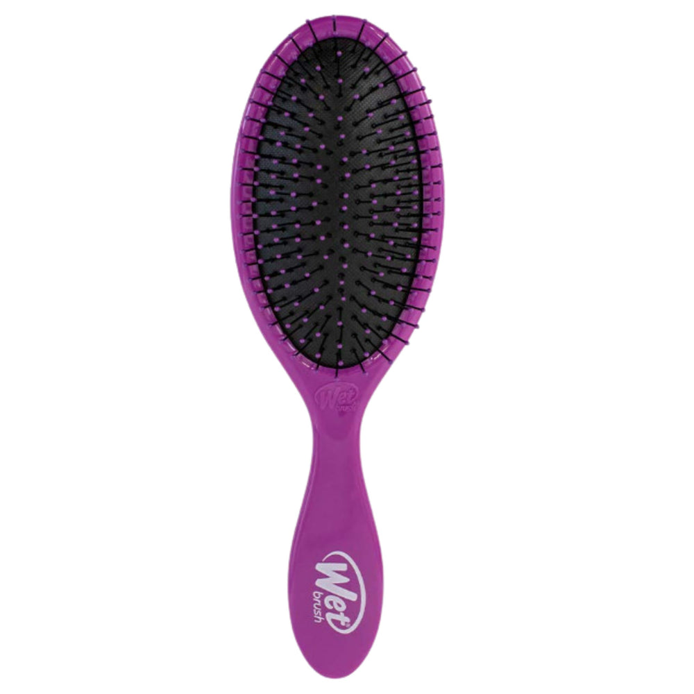 Wet Brush Original Detangler purple close-up with flexible bristles for painless detangling.