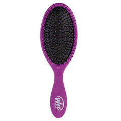 Wet Brush Original Detangler purple close-up with flexible bristles for painless detangling.