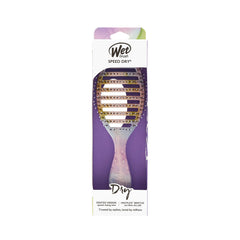 Wet Brush held in hand to show size and grip for comfortable, controlled styling