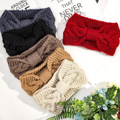 Whaline winter ear warmers on model demonstrating full coverage and practical warmth.