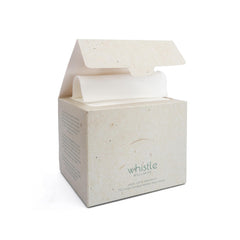 Whistle Wellness disposable face towel box shows reseal design for clean, ready-to-use towels.