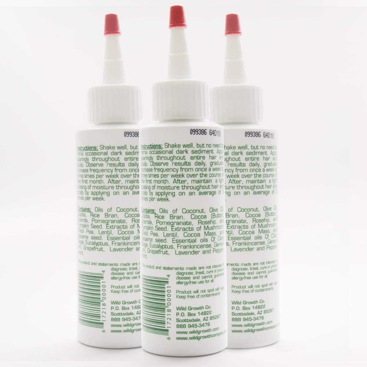 Wild Growth hair oil application close-up shows multi-drop use for longer, softer hair.