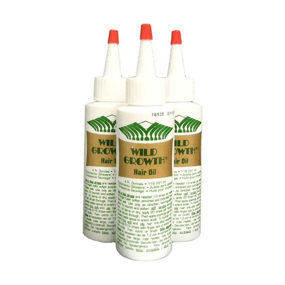 Wild Growth hair oil bottle pour demonstrates easy application for smoother, shinier hair.