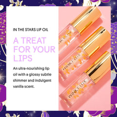 Winky Lux In The Stars Lip Oil with golden stars visible for a playful glow.