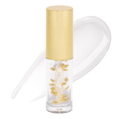 Winky Lux In The Stars Lip Oil tube swirl delivers silky shine and hydration.