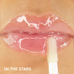 Winky Lux Lip Oil with vitamin E and avocado-sunflower blend for moisture.