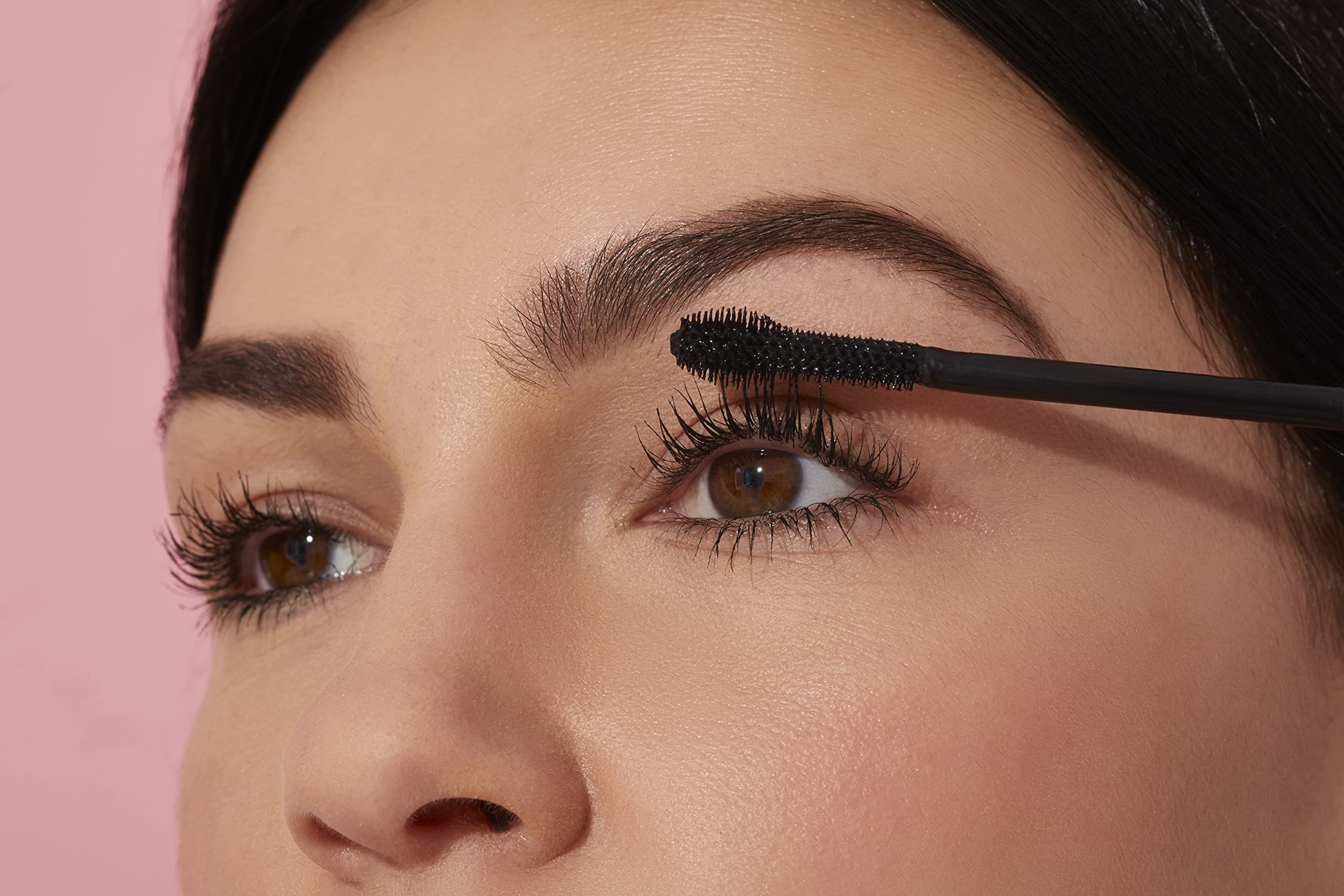 Winky Lux ExtravaLash on lashes shows deep matte black pigment and definition.