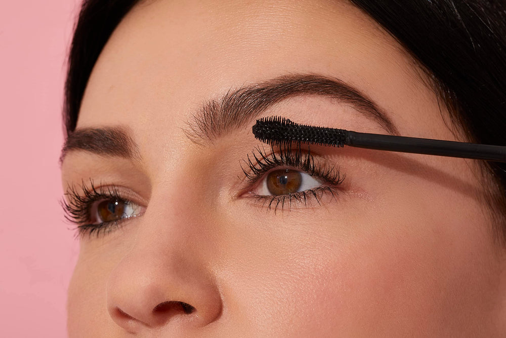 Winky Lux ExtravaLash on lashes shows deep matte black pigment and definition.