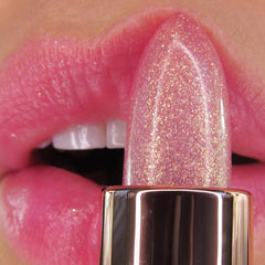 Winky Lux Rose Glimmer Balm application image demonstrates smooth, hydrating lip balm texture.