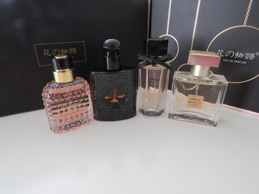Womens-perfume-set unboxing preview shows sleek box and four fragrances.