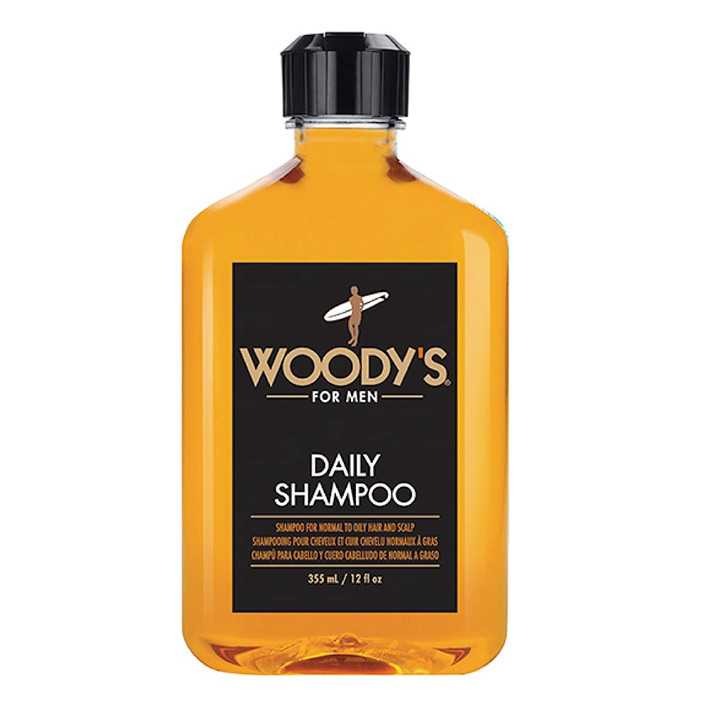 Woody's Daily Shampoo bottle pour shows easy daily cleansing with vitamin-enriched formula.