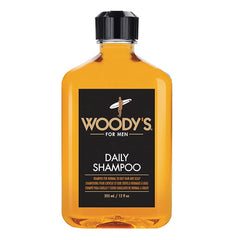 Woody's Daily Shampoo bottle pour shows easy daily cleansing with vitamin-enriched formula.
