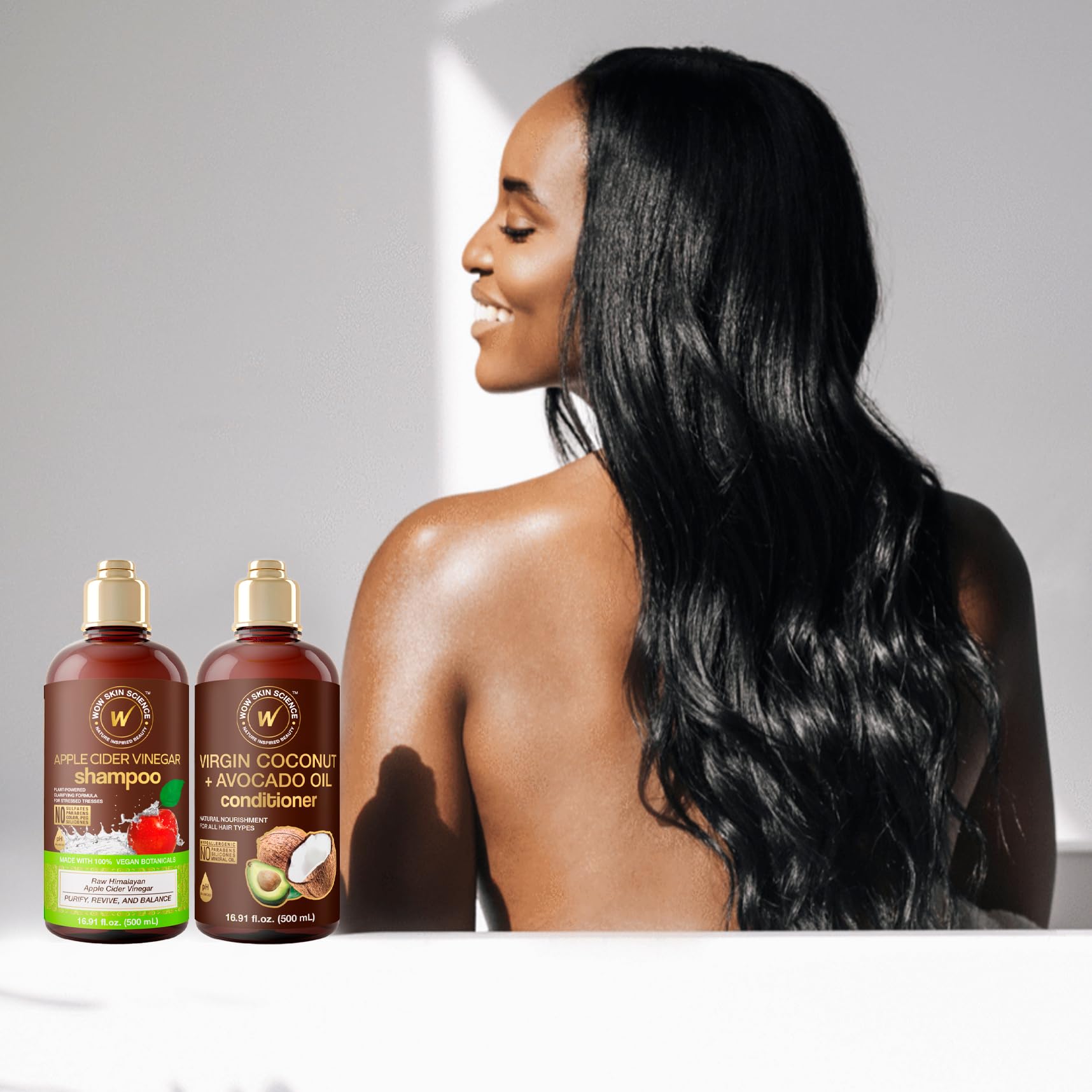 WOW Skin Science conditioner on smooth hair texture closeup