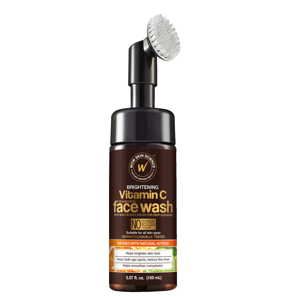 WOW Skin Science Vitamin C Face Wash & Brush bottle on sink, highlighting hydration-friendly formula.