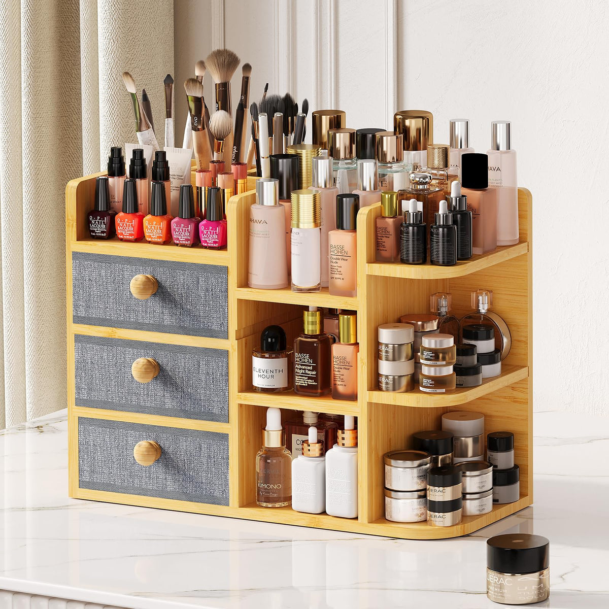 X-cosrack large bamboo makeup organizer with brush holders keeps beauty tools neatly within reach.