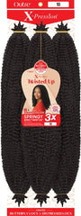 X-pression Outre Twisted Up 3X Afro Twist 24 model showcasing protective styling versatility.